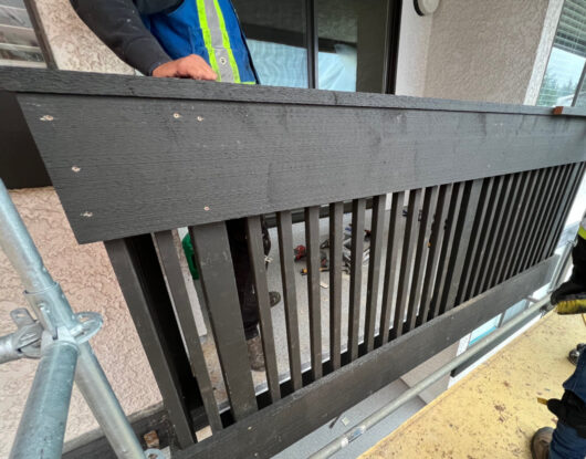 Balcony surface membrane and wooden railing replacement