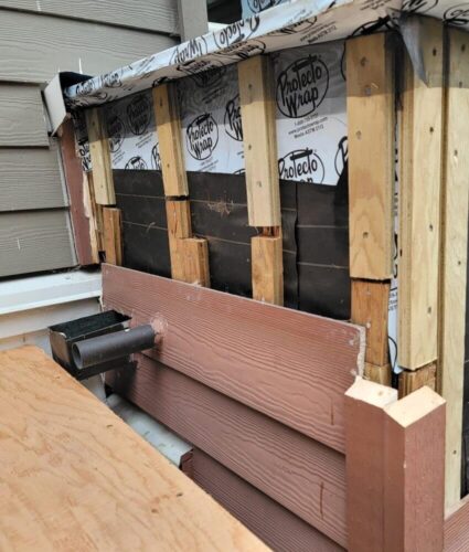 Building Envelope Restoration with New Hardie Board Cladding