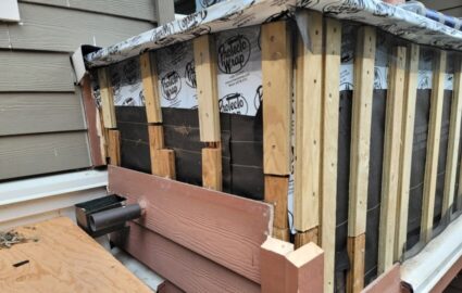 Building Envelope Restoration with New Hardie Board Cladding